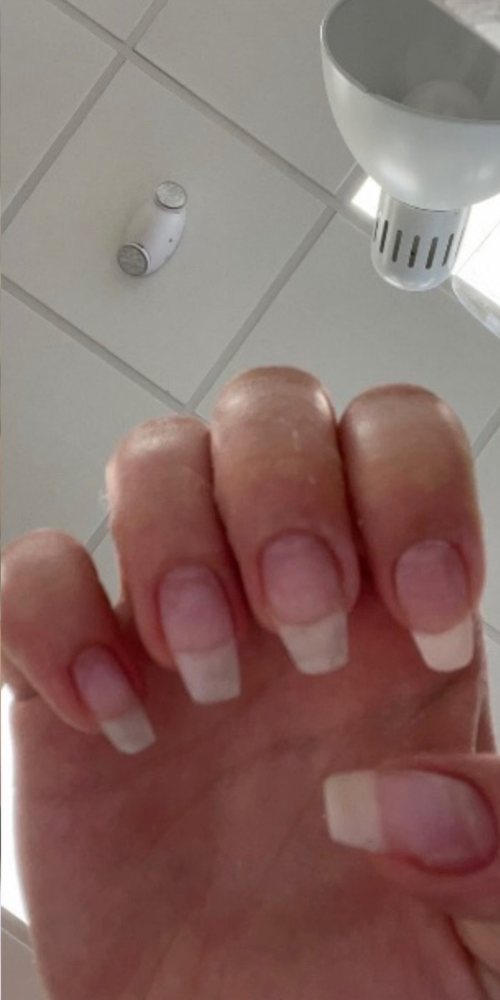 Nails after using Radiant nail growth oil: longer and smoother
